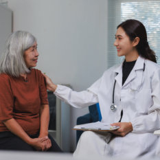 doctor with elderly woman