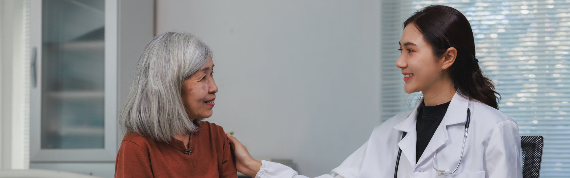 doctor with elderly woman